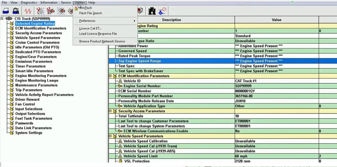 Laptop running diagnostic software to change engine parameters in a semi truck