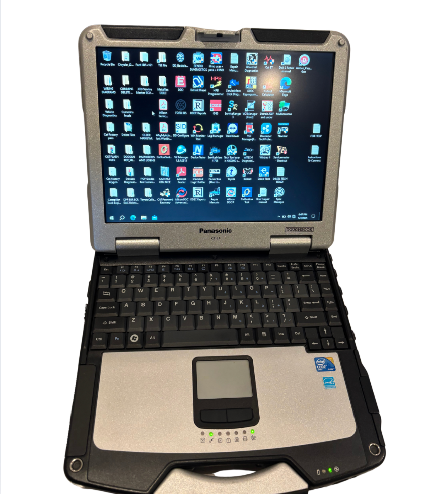 Laptop connected to a semi truck for diagnostics